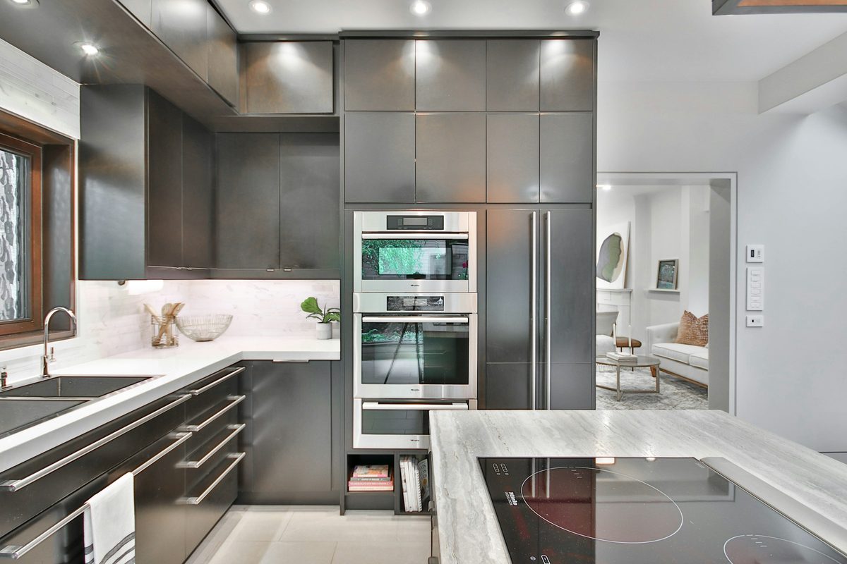 Double wall oven built into a kitchen cabinet run
